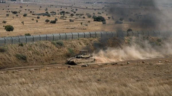 Israeli force enters Wadi al-Raqad and detains young men inside a house